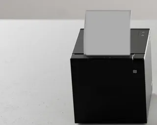 Label printer issuing a name badge
